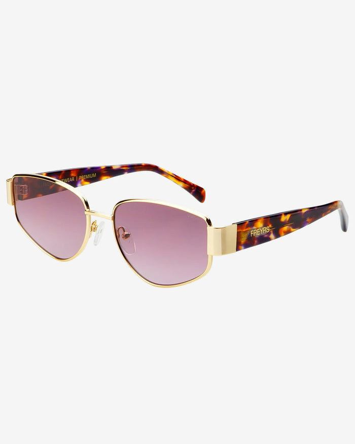 Off-model angled view of the Freyrs Delilah Sunglasses in gold.