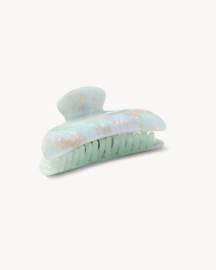 Off-model angled front view of the Machete Midi Claw in astral mint showing the teeth.