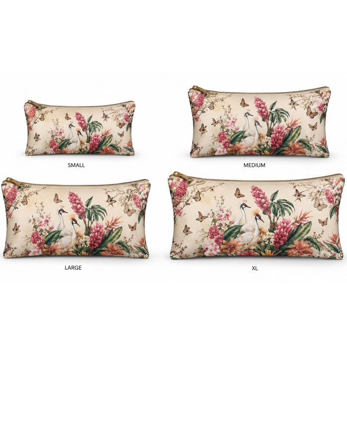 Four botanical-print vegan leather zipper pouches, sizes small to XL, bird and floral