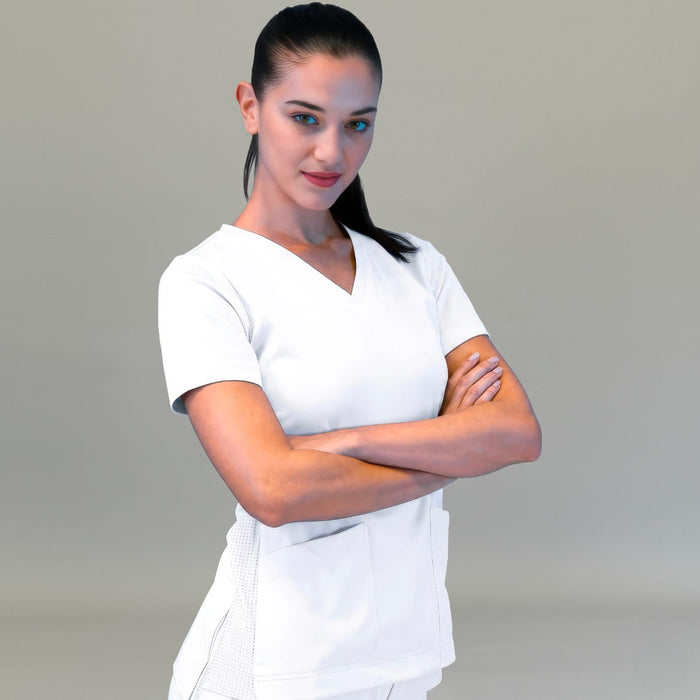 Women's Style 530 White scrub top, front three-quarter view with arms crossed