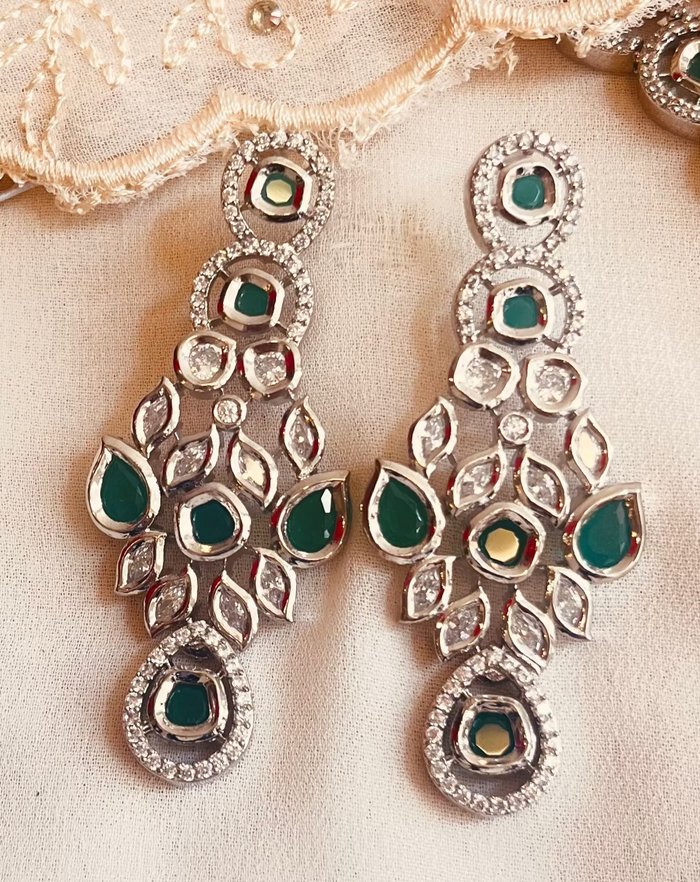MOHAR Kundan-style choker set in emerald-tone stones with silver-finish base