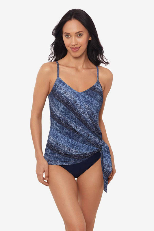 Woman wearing a multicolor tankini top with an abstract print