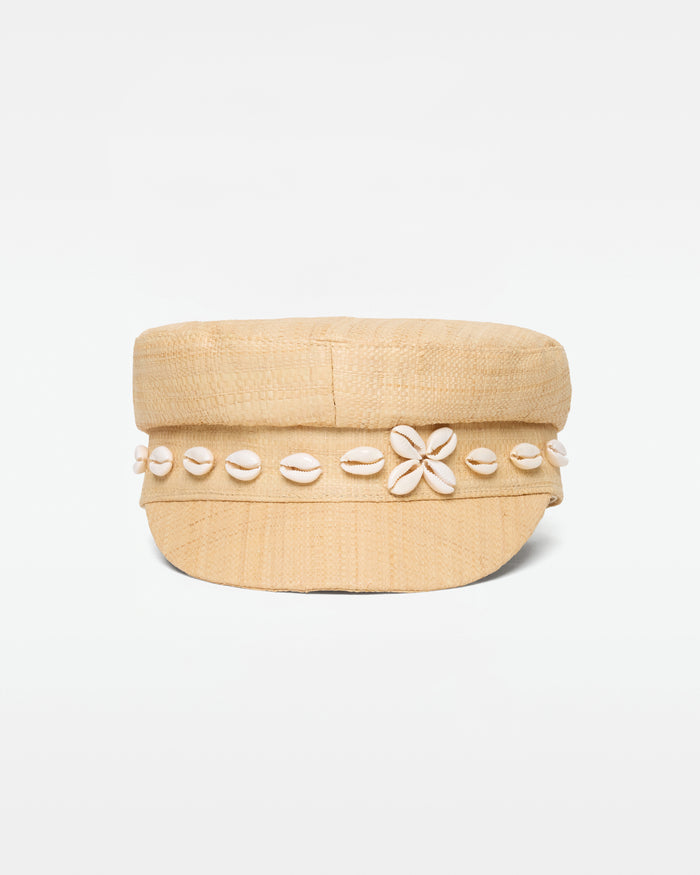 Off-model front view of the Alfama Cap in natural showing the cowrie shell band trim with a flower motif, on a white background.