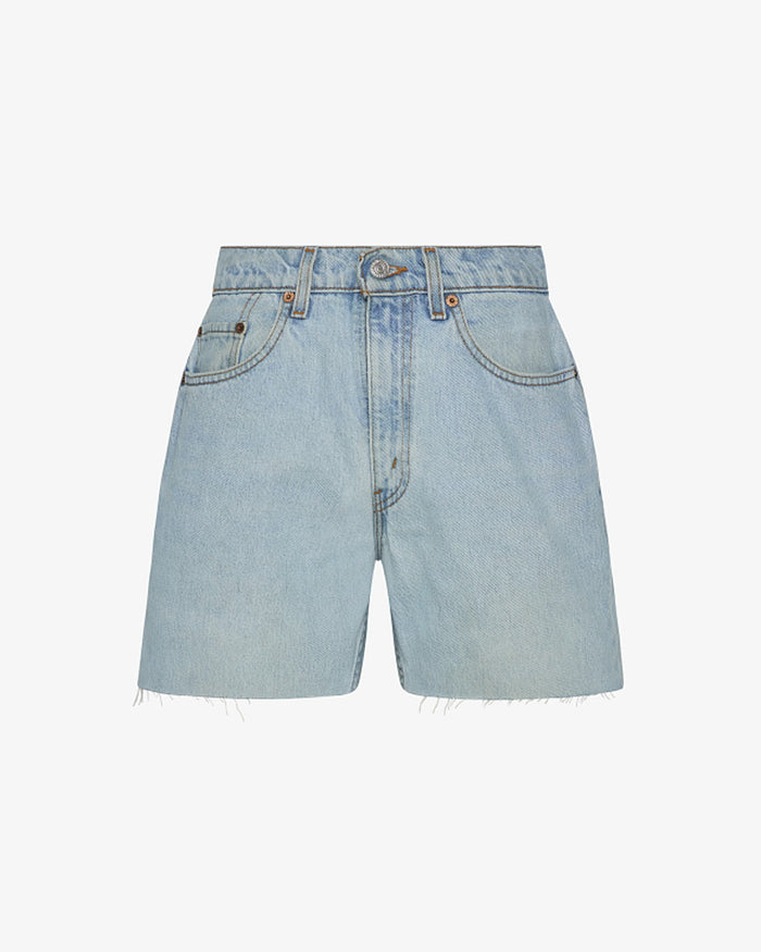 Off-model view of the aligrace Long Baggy Short in light wash, showing a relaxed-fit denim short with a raw frayed hem.