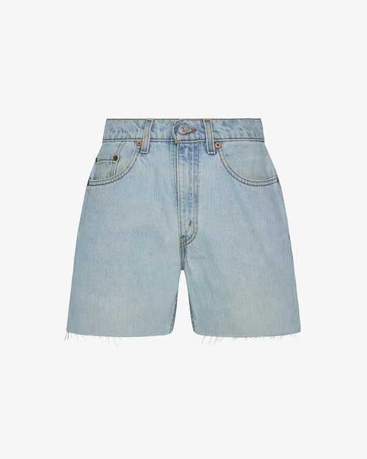 Off-model view of the aligrace Long Baggy Short in light wash, showing a relaxed-fit denim short with a raw frayed hem.