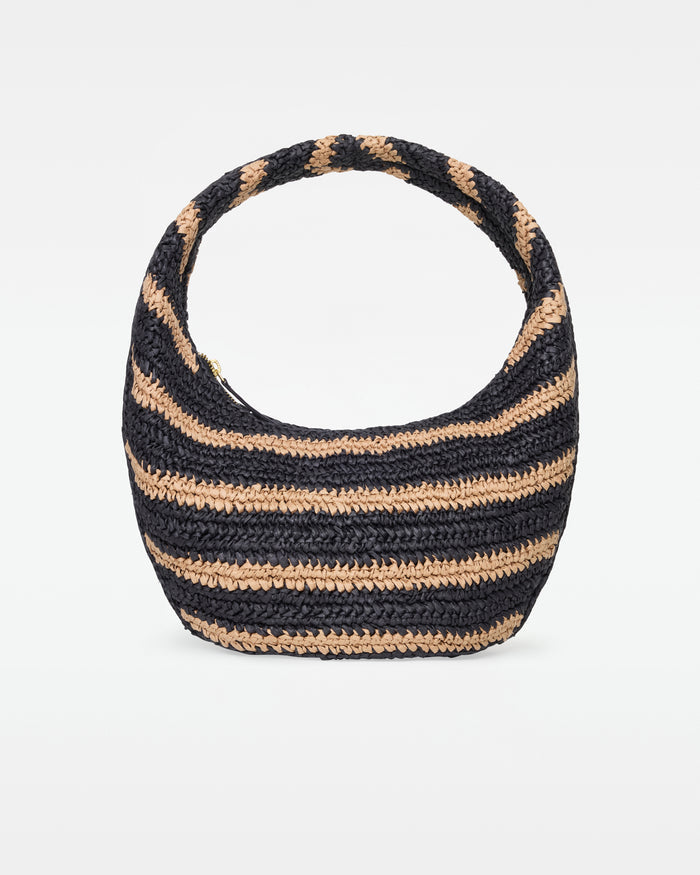 Off-model front view of the Aya Bag in natural-black, a crescent-shaped woven raffia hobo bag with black and natural horizontal stripes, on a white background.