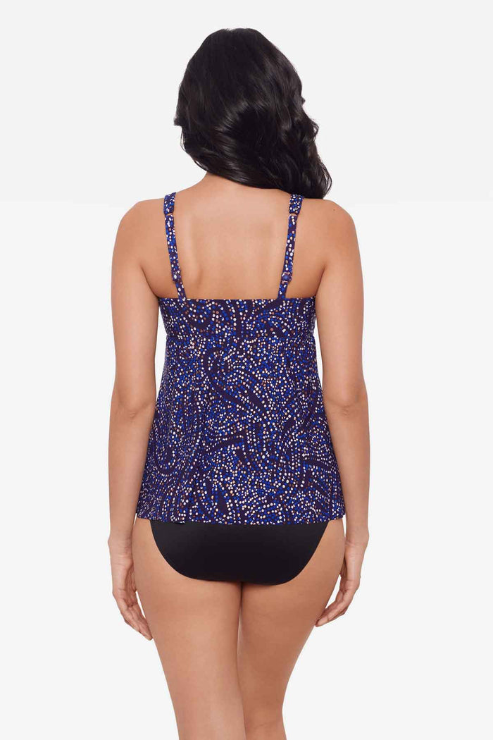 Woman facing away to show off the multicolor tankini top