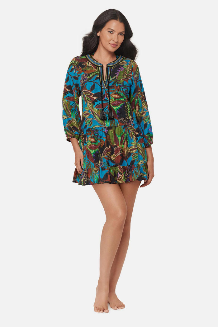 Woman wearing a multicolored abstract paisley printed beach dress swim cover up