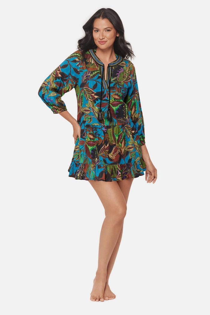 Woman wearing a multicolored abstract paisley printed beach dress swim cover up