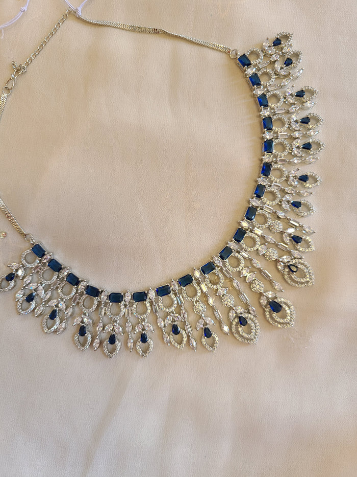 MOHAR statement necklace set in blue cubic zirconia stones with clear accents