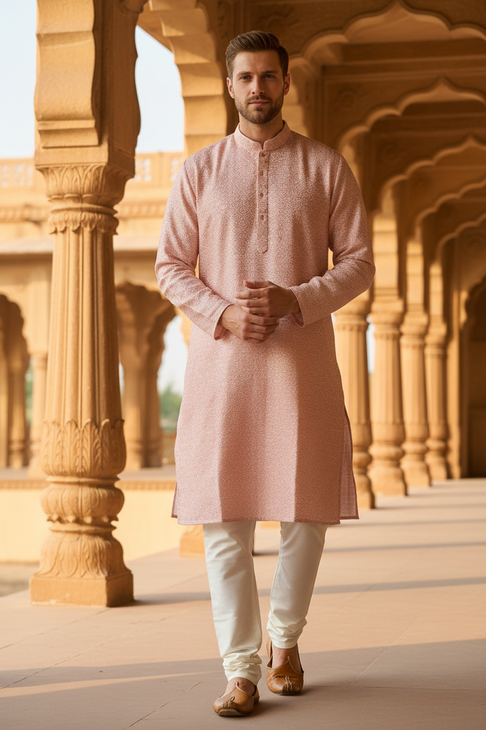 Close-up — male model in blush ombre jacquard kurta, palace corridor