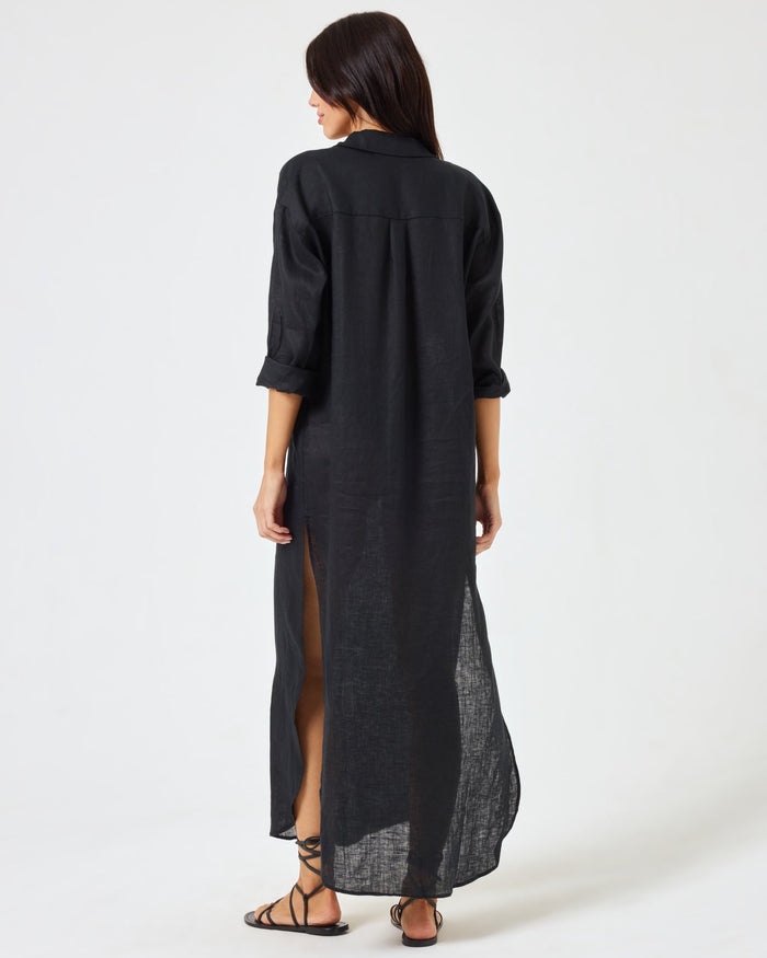 Back view of a model wearing the LSPACE Capistrano Tunic in black linen.