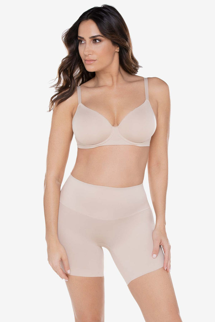 Woman in a shapewear swim wear.