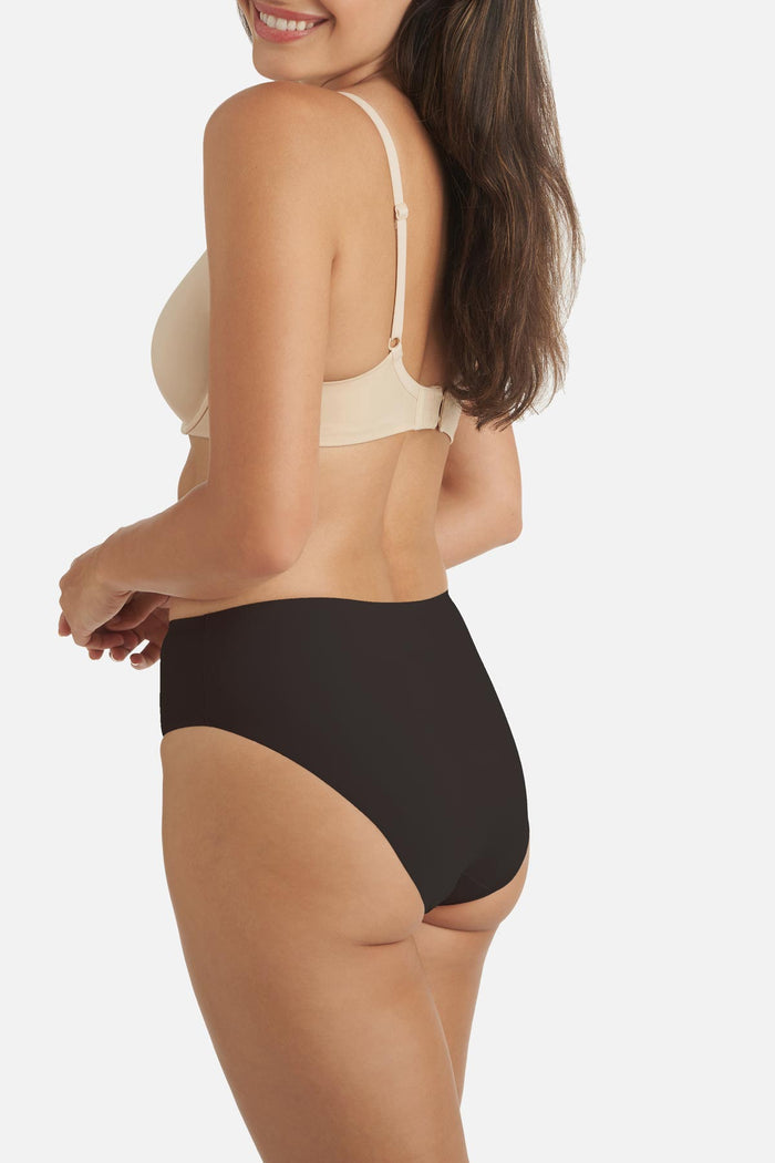 Woman turned left wearing a black colored shaping panty
