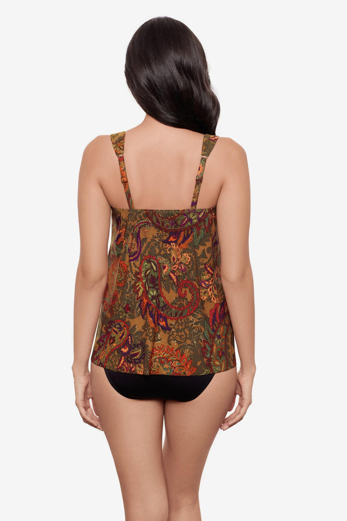 Woman turned away wearing a multicolored paisley printed tankini top
