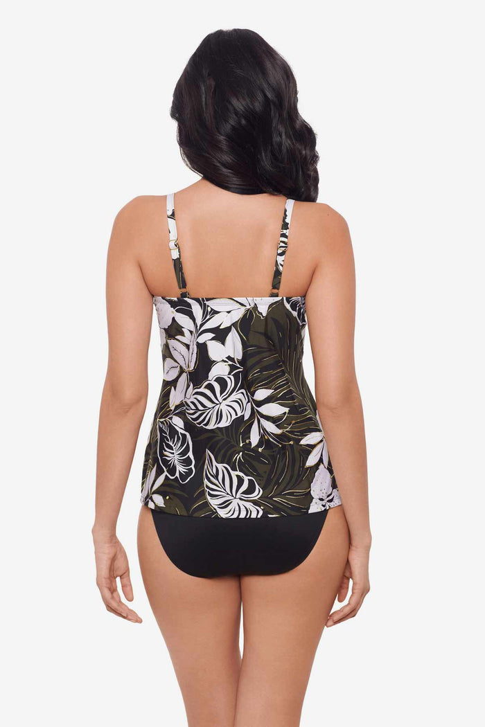 Woman facing away wearing a multicolor tankini top