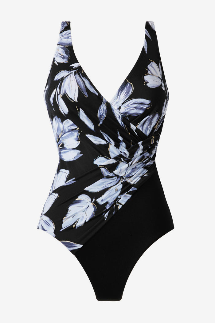 White floral print one-piece swimsuit with a black panel on the side