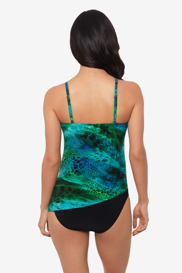Woman facing away wearing a multicolor tankini top