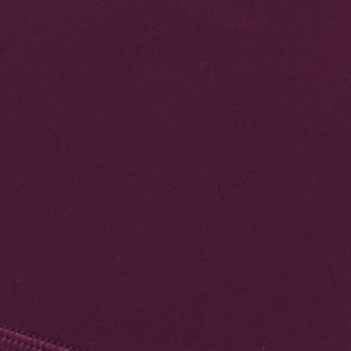 Fabric swatch for the LSPACE En Pointe Short in plum, showing the plum color and fabric texture.