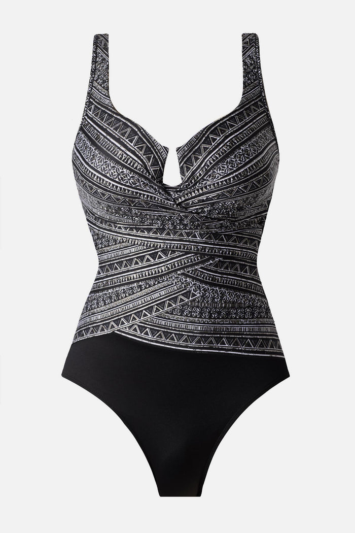 Black and white geometric printed one-piece swimsuit with a sweetheart neckline