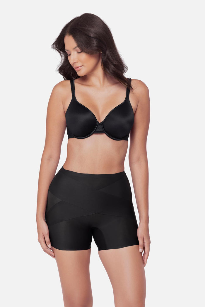 Woman wearing a black boy short shapewear pant