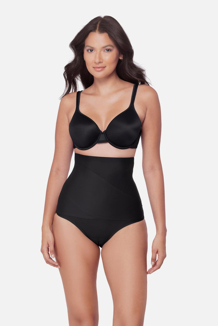 Woman wearing a black high waisted brief shapewear