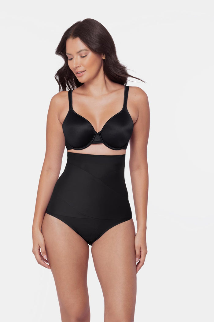 Woman wearing a black high waisted brief shapewear