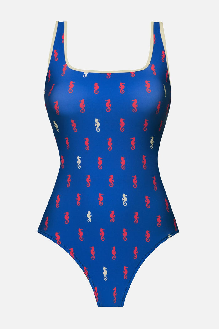 Blue one-piece swimsuit with red and white seahorse pattern
