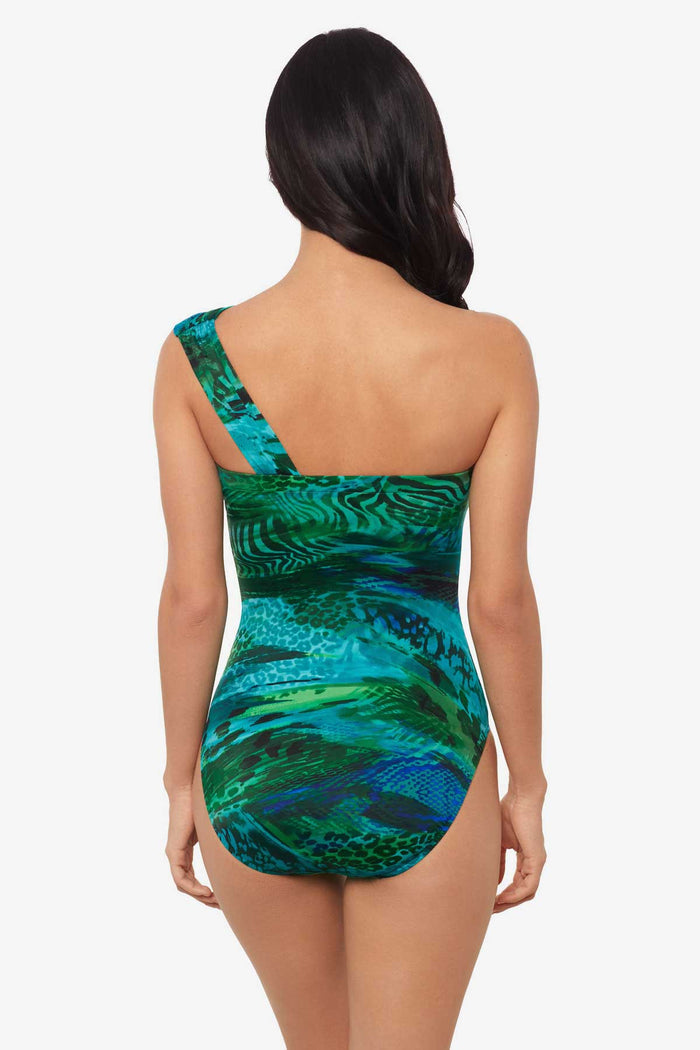 Woman facing away wearing a multicolor one-piece swimsuit