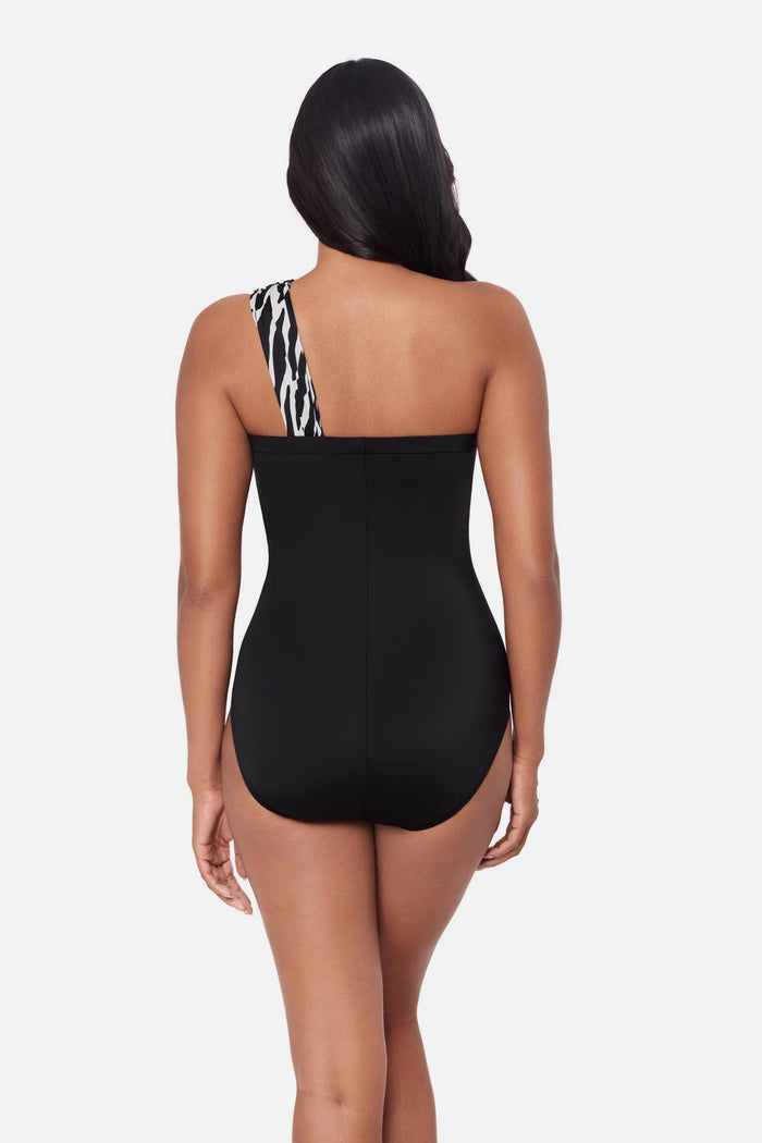 Back view of Goddess One Piece in Sand Tracks