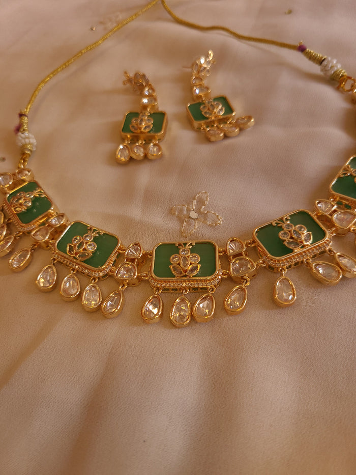 MOHAR Kundan-style choker set in green stones with gold-finish base