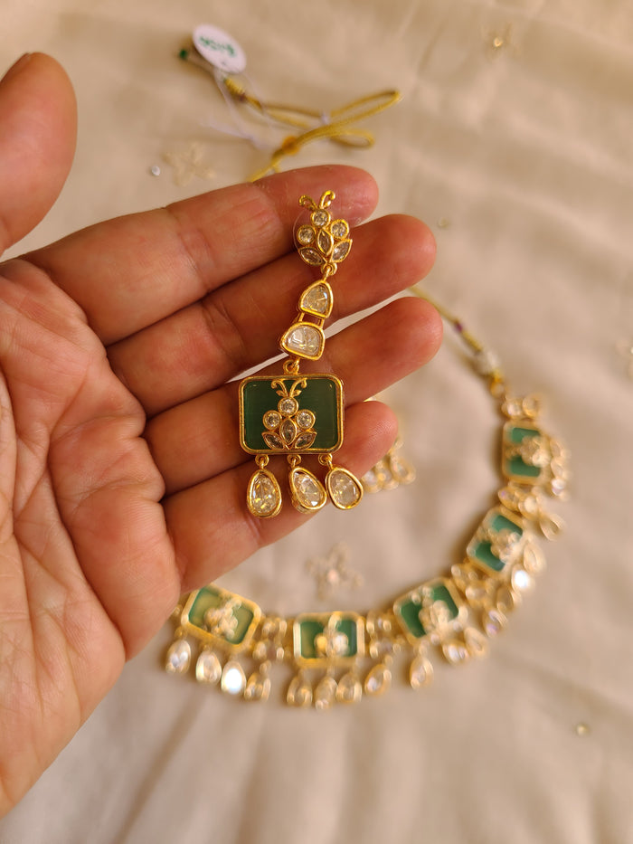 MOHAR Kundan-style choker set in green stones with gold-finish base