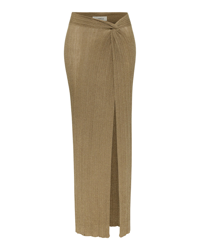 Off-model view of the LSPACE Heart Of Gold Skirt in metallic gold, showing the full-length maxi silhouette with twisted crossover waistband detail and front slit on a white background.