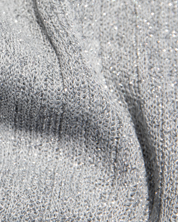 Close-up of the LSPACE Heart Of Gold Tank in metallic silver, highlighting the shimmer detail of the ribbed knit fabric.
