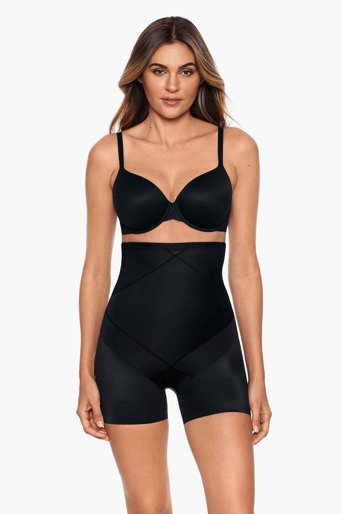 Woman wearing a high waist tummy control shapewear.