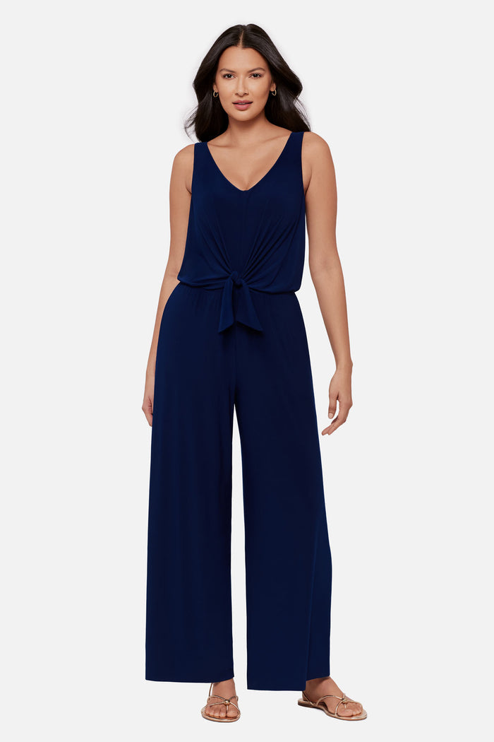Woman wearing a navy-blue sleeveless romper