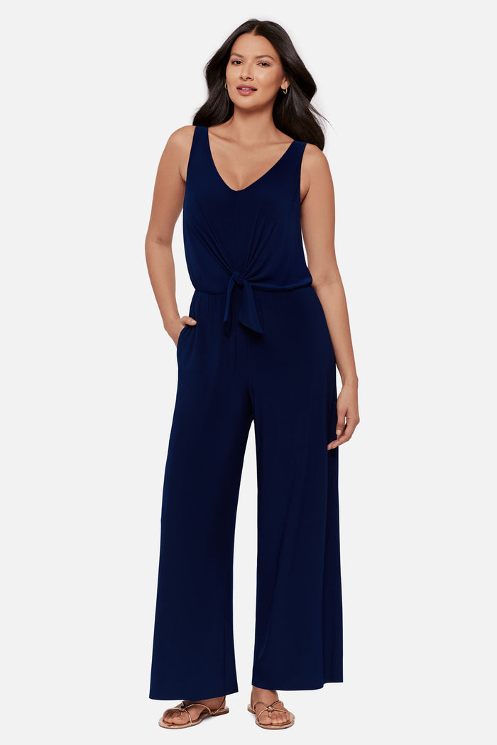 Woman wearing a navy-blue sleeveless romper