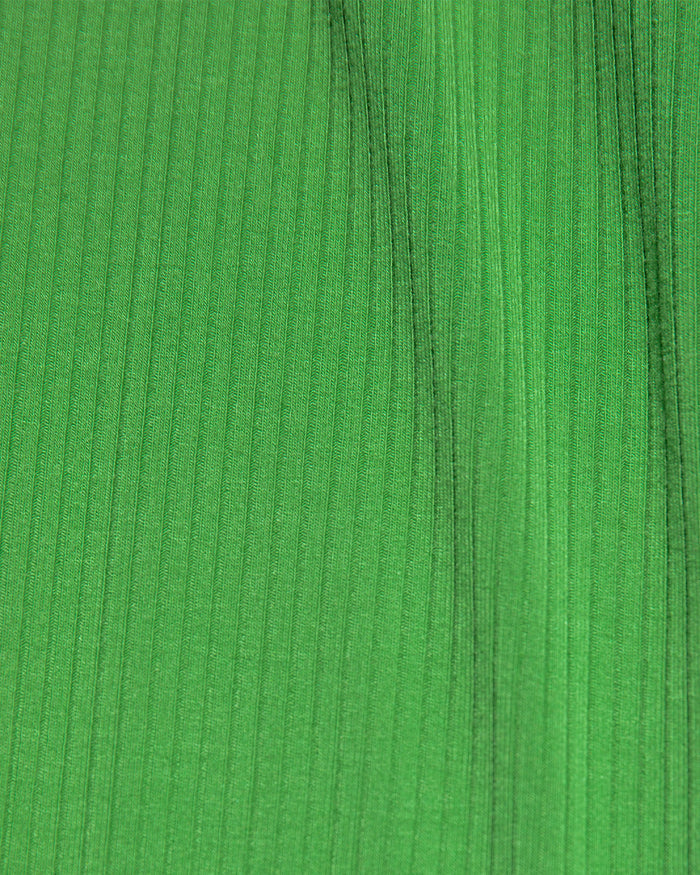 Close-up of the LSPACE Jordana Dress in clover-cream, highlighting the clover green ribbed knit fabric texture.