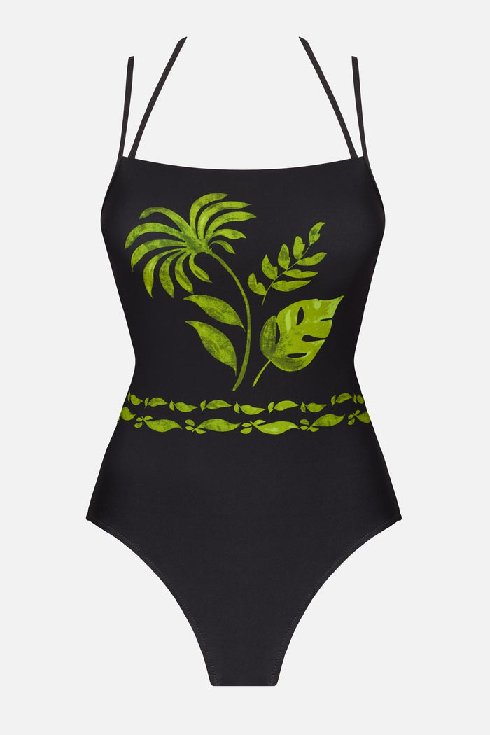 One-piece swimsuit with various palm leaves on the front