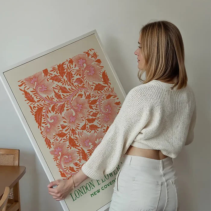 London Flower Market Covent Garden Print held up against a living room wall
