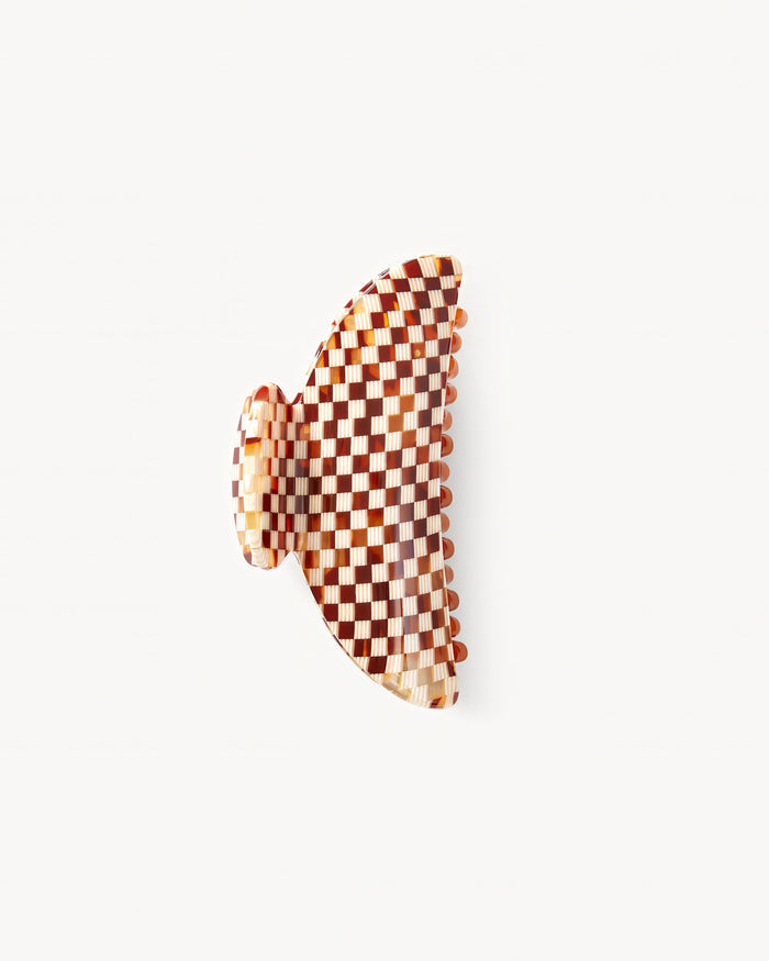 Off-model image of the Machete Midi Claw in brown, a brown and cream checkered claw clip, on a white background.