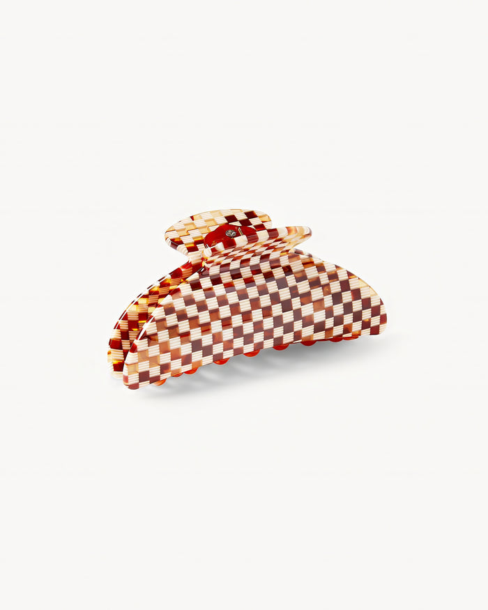 Close-up of the Machete Midi Claw in brown showing the checkered pattern detail and clip mechanism.