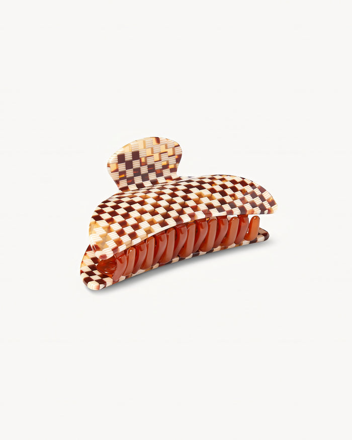 Angled view of the Machete Midi Claw in brown showing the checkered pattern from a different angle.