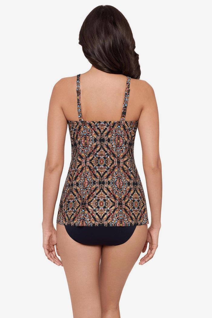 Woman turned away wearing a multicolor tankini top