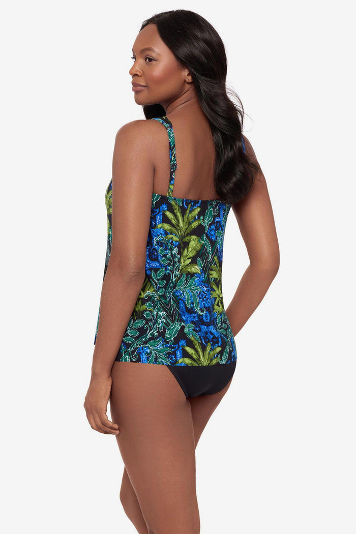 Woman turned left wearing a mesh detail tankini top with a multicolor abstract print