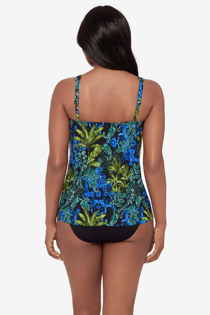 Woman turned away wearing a mesh detail tankini top with a multicolor abstract print