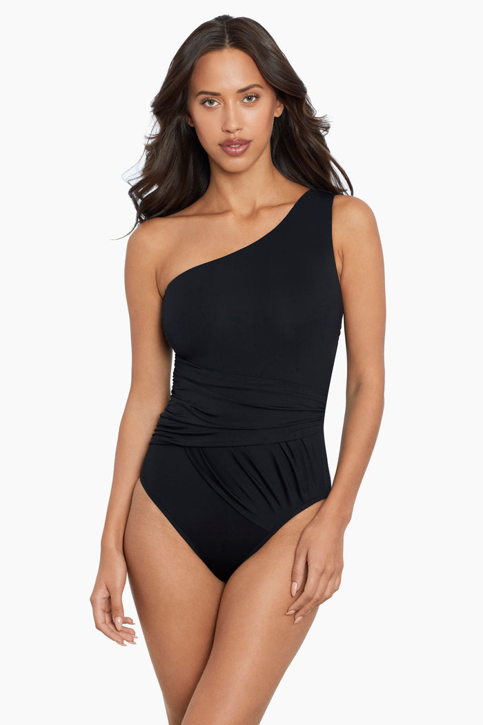 Woman in a magic suit one piece swim suit.
