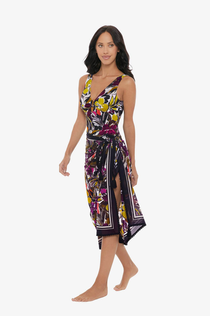 Woman turned left wearing a multicolored floral print cover up