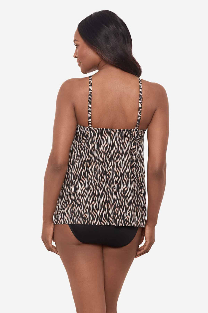 Woman facing away showing the back of a multicolor tankini top