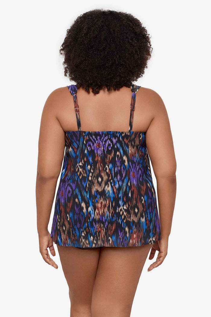 Woman turned away Woman wearing a multicolor tankini top